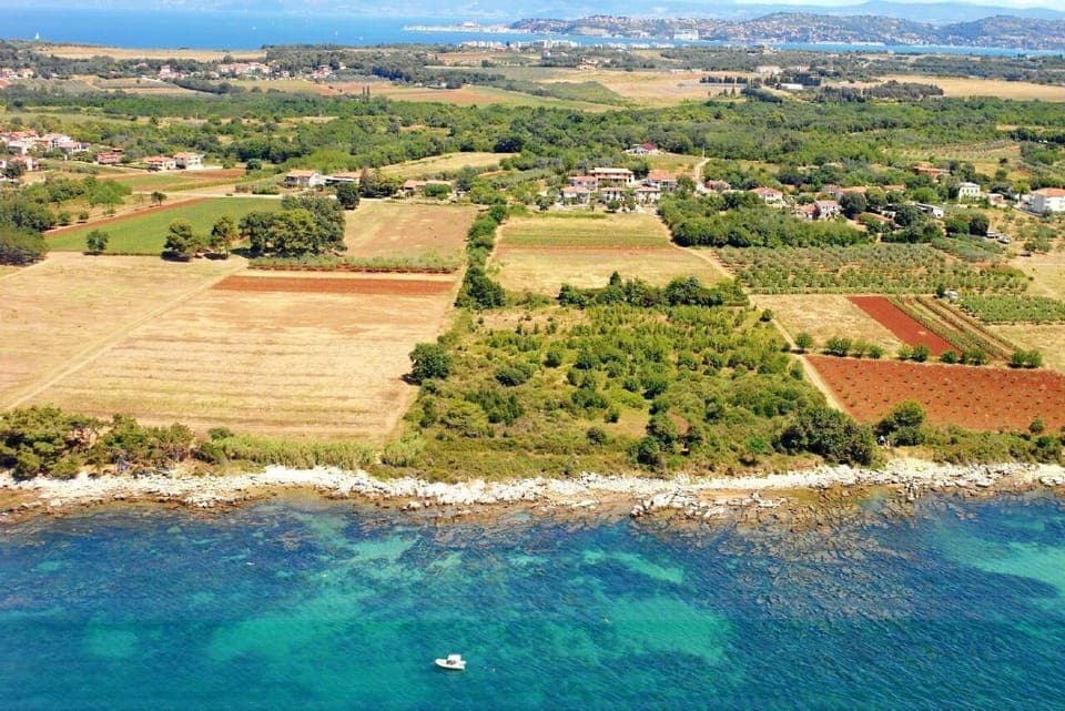 The aerial overview of the rocky coast of Zambratija