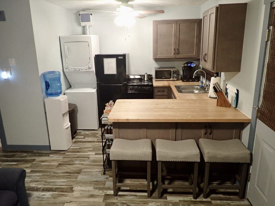 Open floor plan kitchen and dining area with laundry center. Jan ‘22