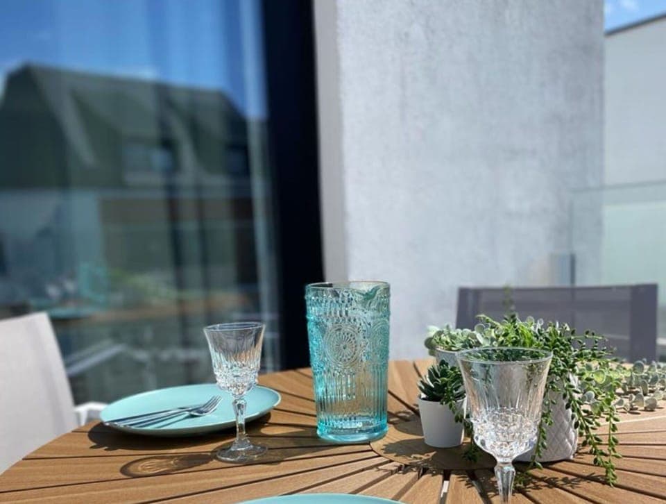 Tableware, Table, Furniture, Property, Drinkware, Window, Dishware, Blue, Plant, Wood