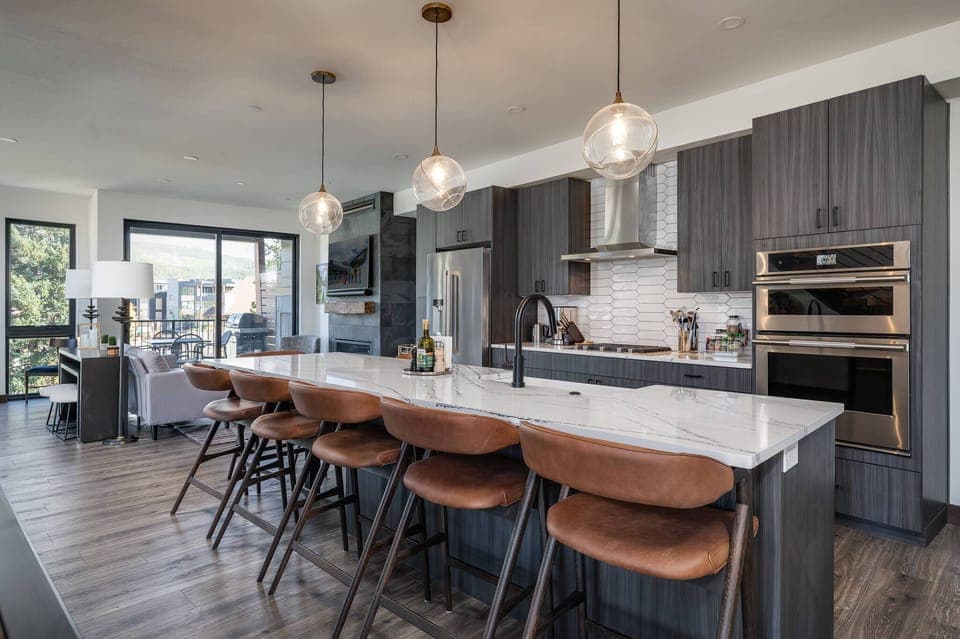 Open concept kitchen that flows into the living & dining room