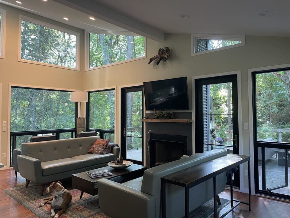 Amazing views of your one acre duneland yard through soaring 15 ft windows