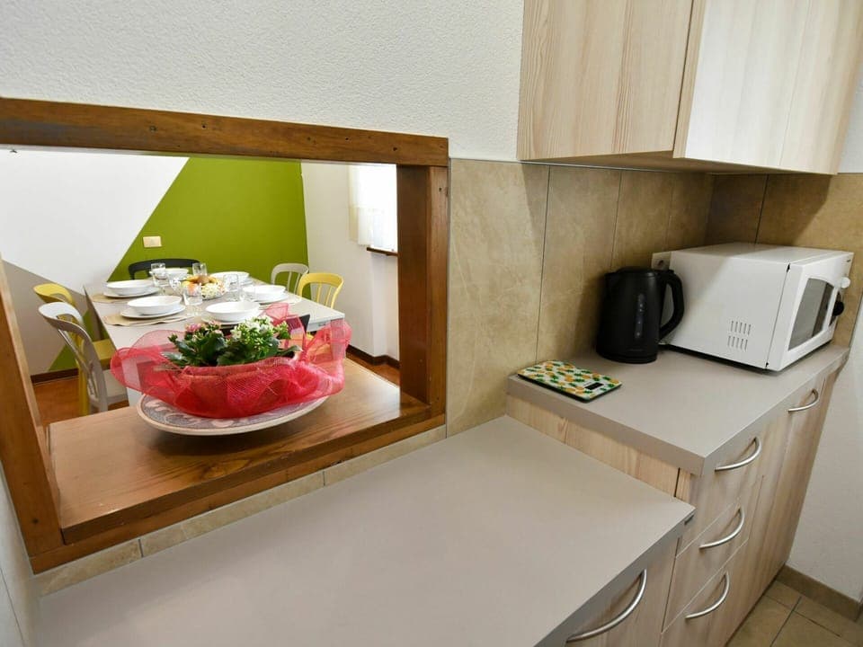 Property, Furniture, Cabinetry, Countertop, Kitchen Appliance, Kitchen, Shelving, Shelf, Interior Design, Wood