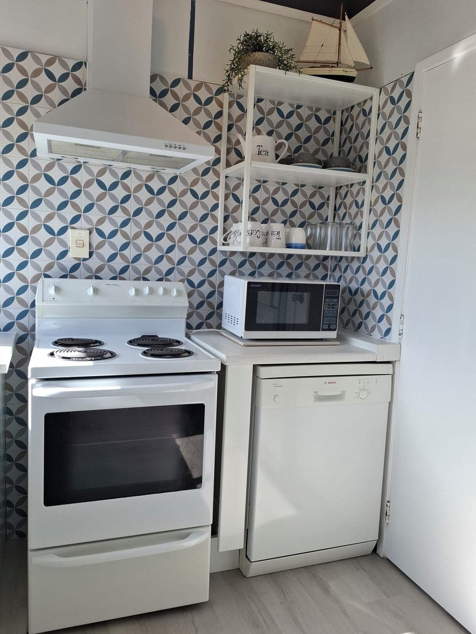 kitchen stove, dishwasher and microwave 