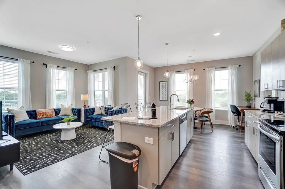 Large kitchen island with lots of counter space and seating