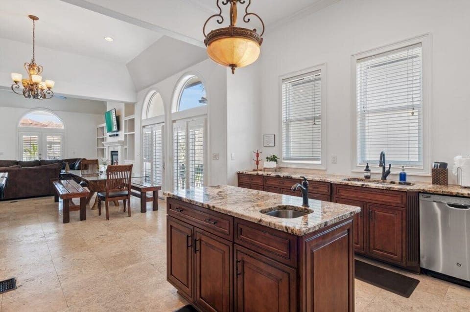 Kitchen island with prep sink and ample workspace
