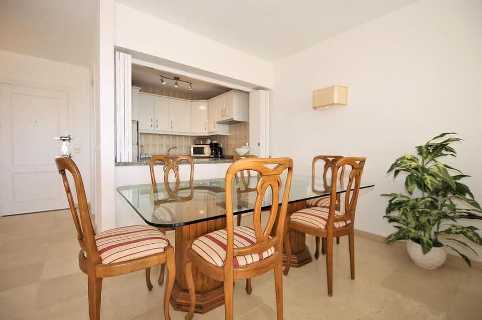 Dining area next to the kitchen with seating for six guests