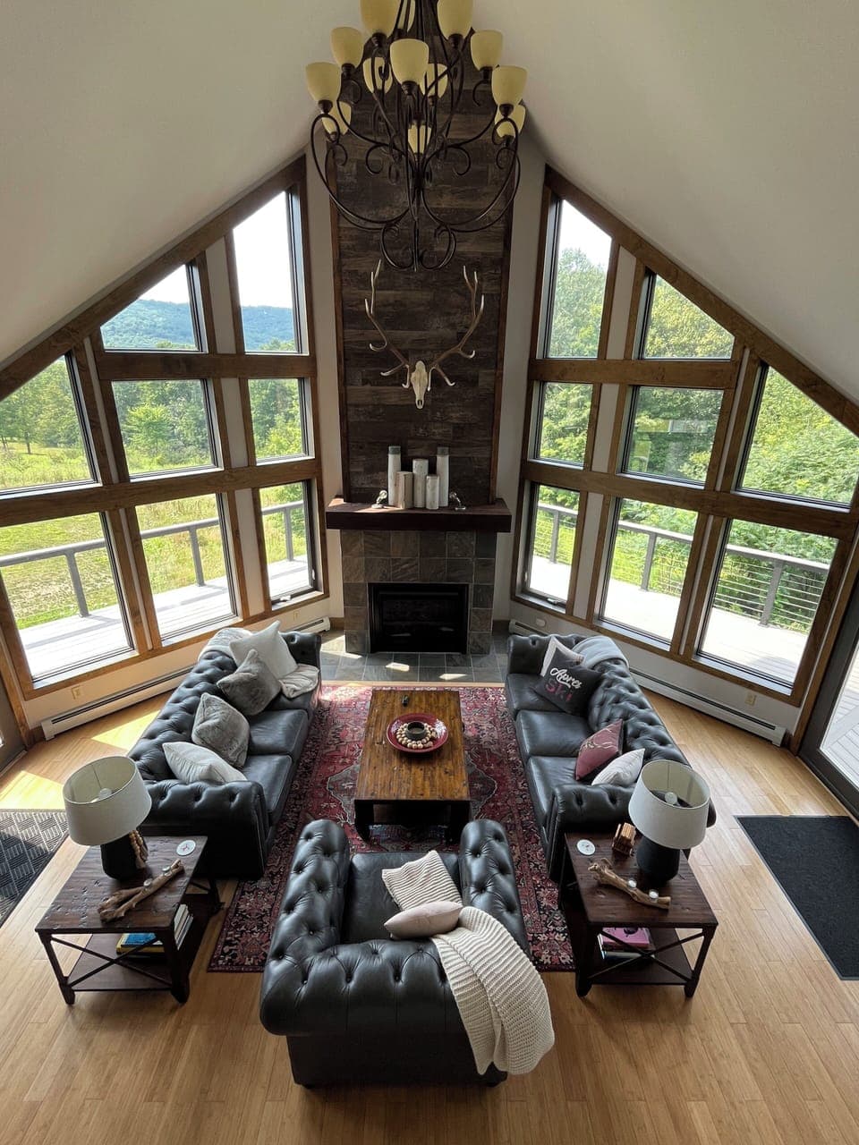 Inspiring great room with ample seating, cozy fireplace and killer views.  