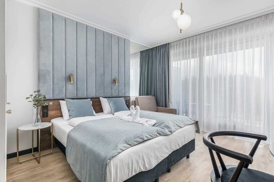 Modern bedroom with a double bed and stylish design