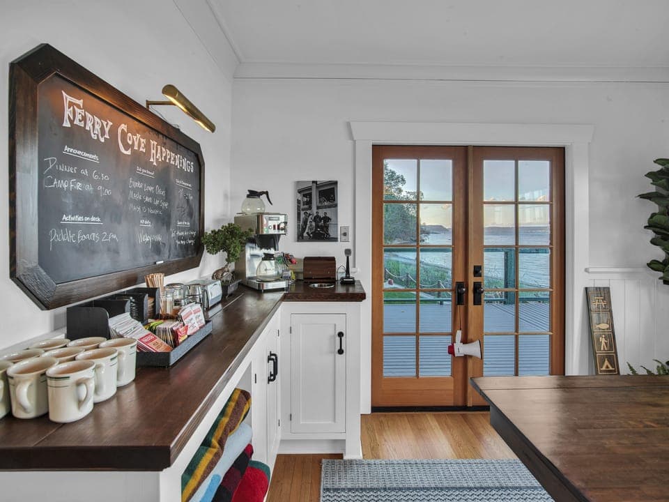 Fully stocked coffee bar and french doors out to the backyard and beach.
