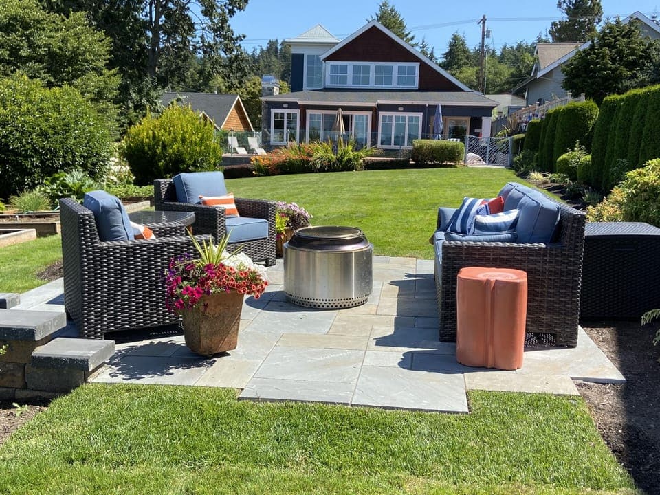 Patio overlooking Saratoga Passage. Firepit not available during burn bans.