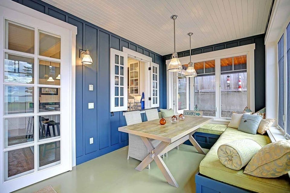 The dining space is informal, and provides a beautiful view of the Puget Sound