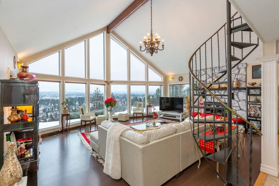 Spiral staircase to the loft, Cozy fireplace, and Windows for the soul