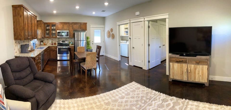 From the front window looking toward the kitchen. Bedroom is first door on right