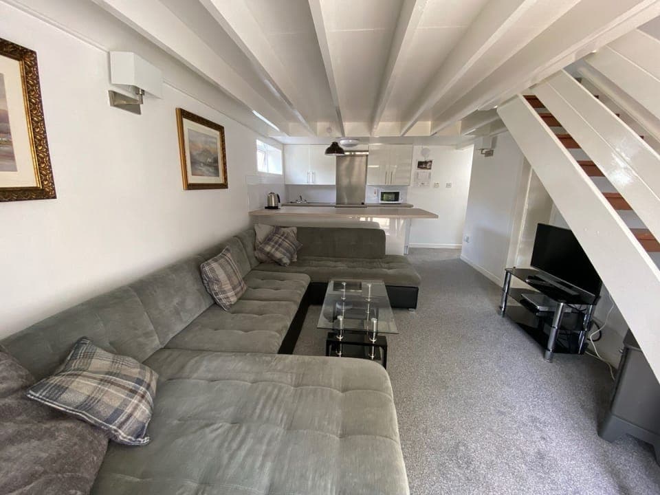 Lounge with open plan kitchen