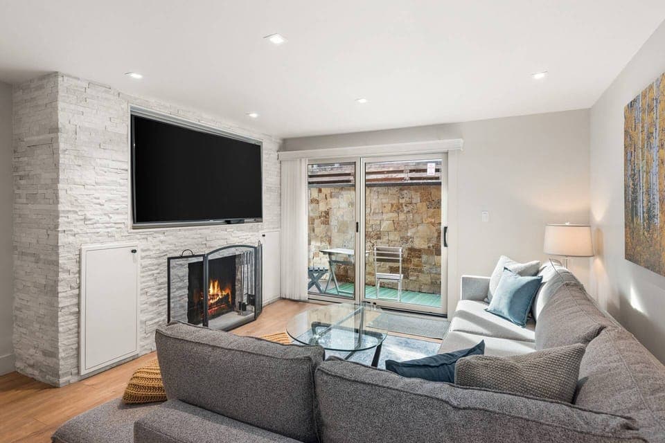 Evenings will be enjoyed by all as you relax on the comfortable sofa in front of the wood burning fireplace and large TV.