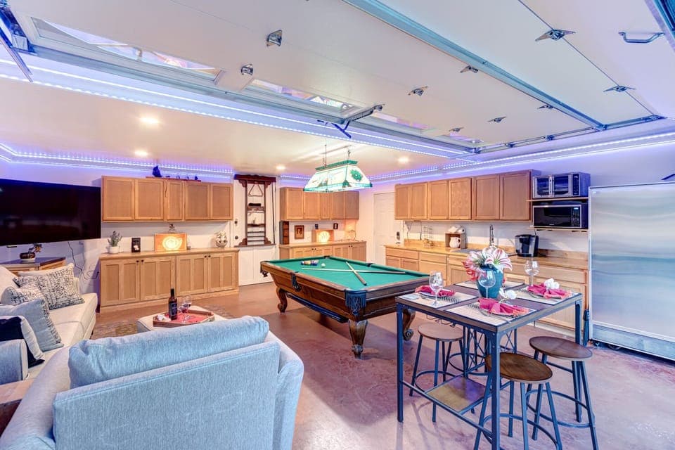 Great room with Billiard or Ping Pong, Quee Sofa Couch, 75" TV, dining table wit