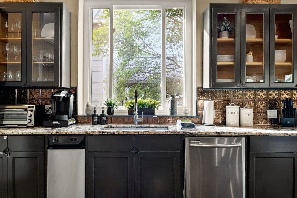 Bright, well-equipped kitchen with tons of natural light. 