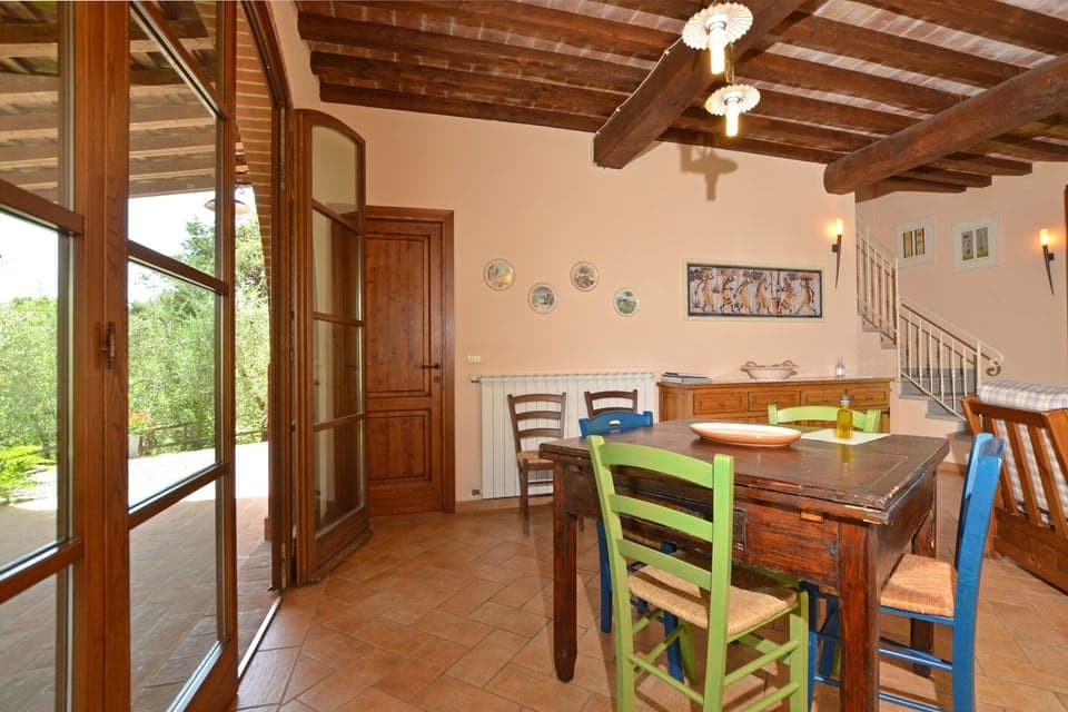 The dining room with kitchen corner in one of the units