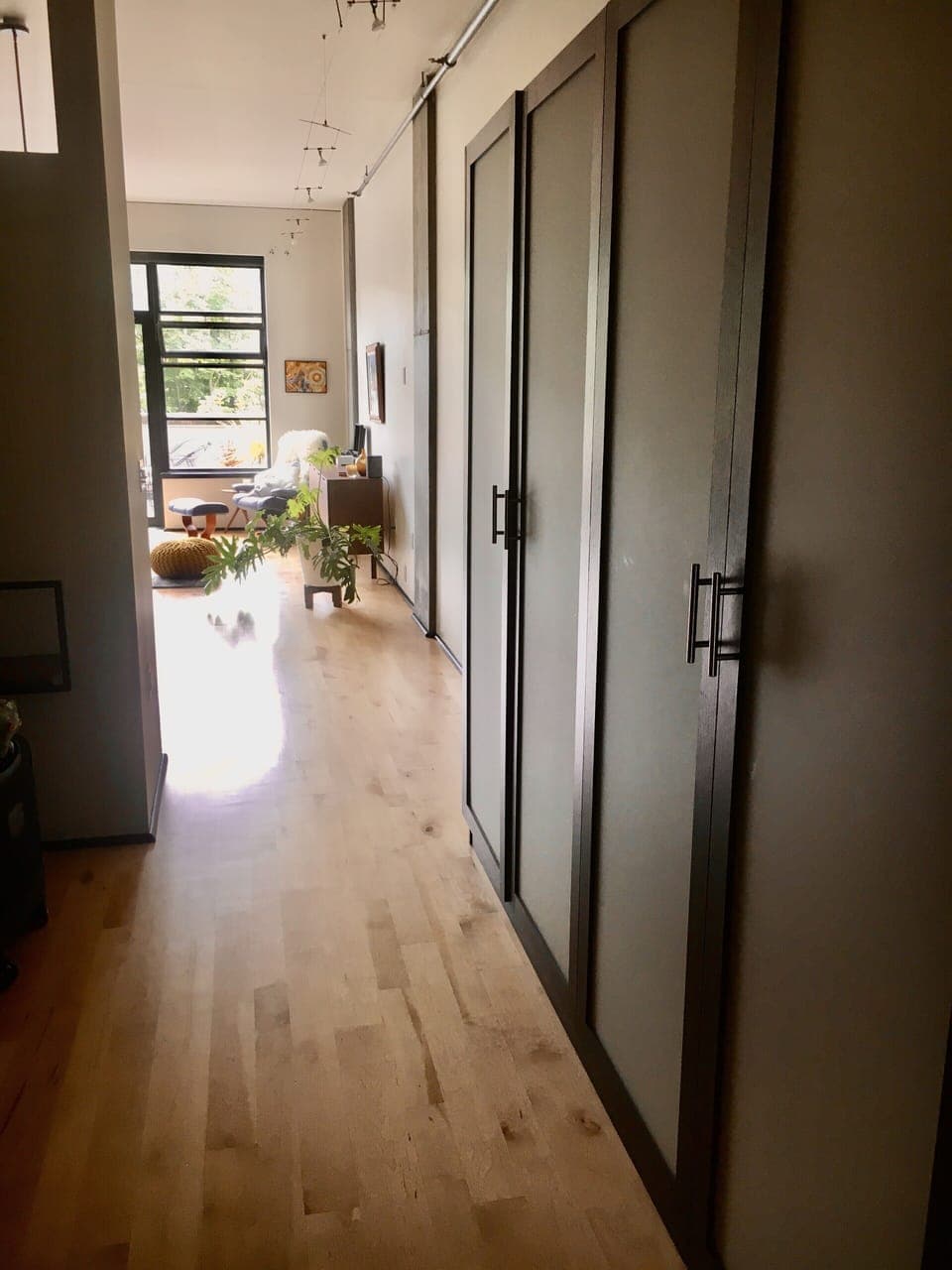 California closets on either side of the bedroom with desk space & WIFI printer