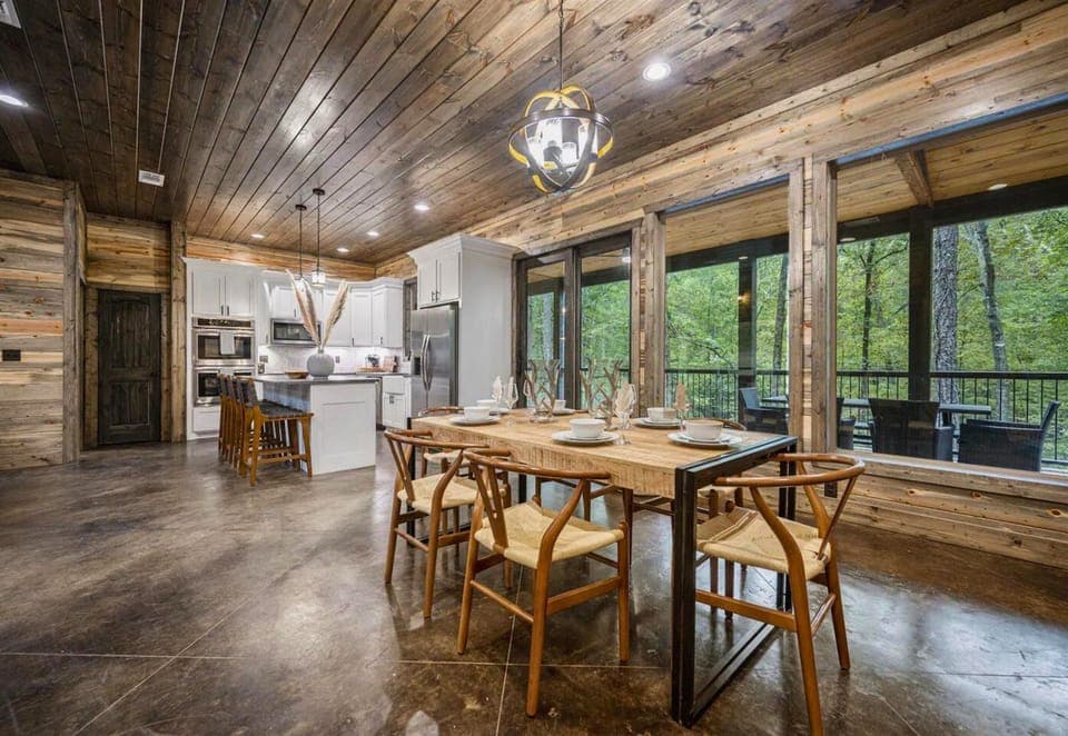 Gather at our dining table, where stories are shared and feasts become lasting memories. Overlooking the tranquil woods, it’s where each meal is as picturesque as it is delicious.