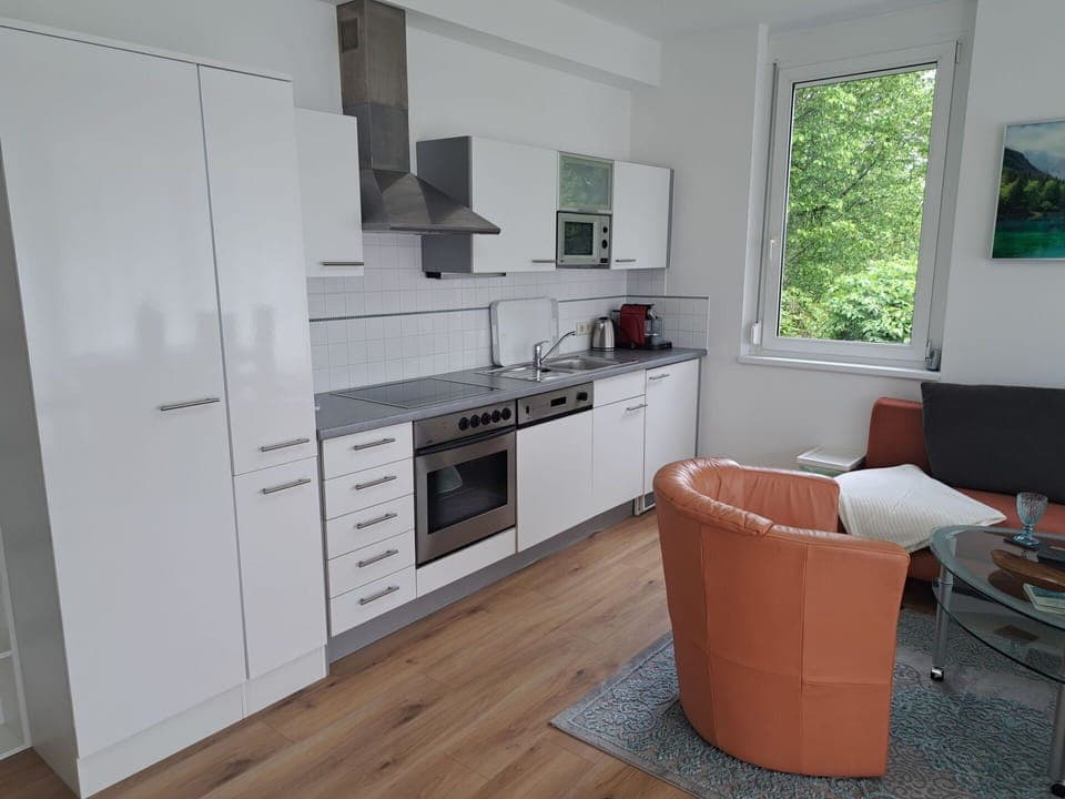 Cabinetry, Countertop, Property, Window, Kitchen, Kitchen Appliance, Drawer, Wood, Building, Kitchen Stove