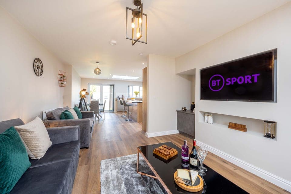 Large open plan luxurious living area -55" 4K smart HDTV, BT Sports HD,huge sofa