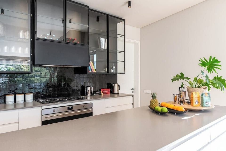 Kitchen is located on the upper level. 