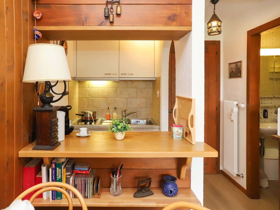 Property, Furniture, Cabinetry, Table, Wood, Interior Design, Kitchen, Countertop, Living Room, Floor