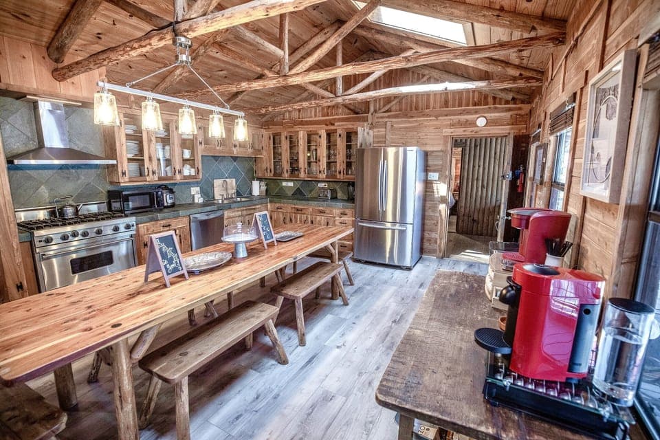 Open concept living, dining & kitchen. Dining table seats up to 12.
