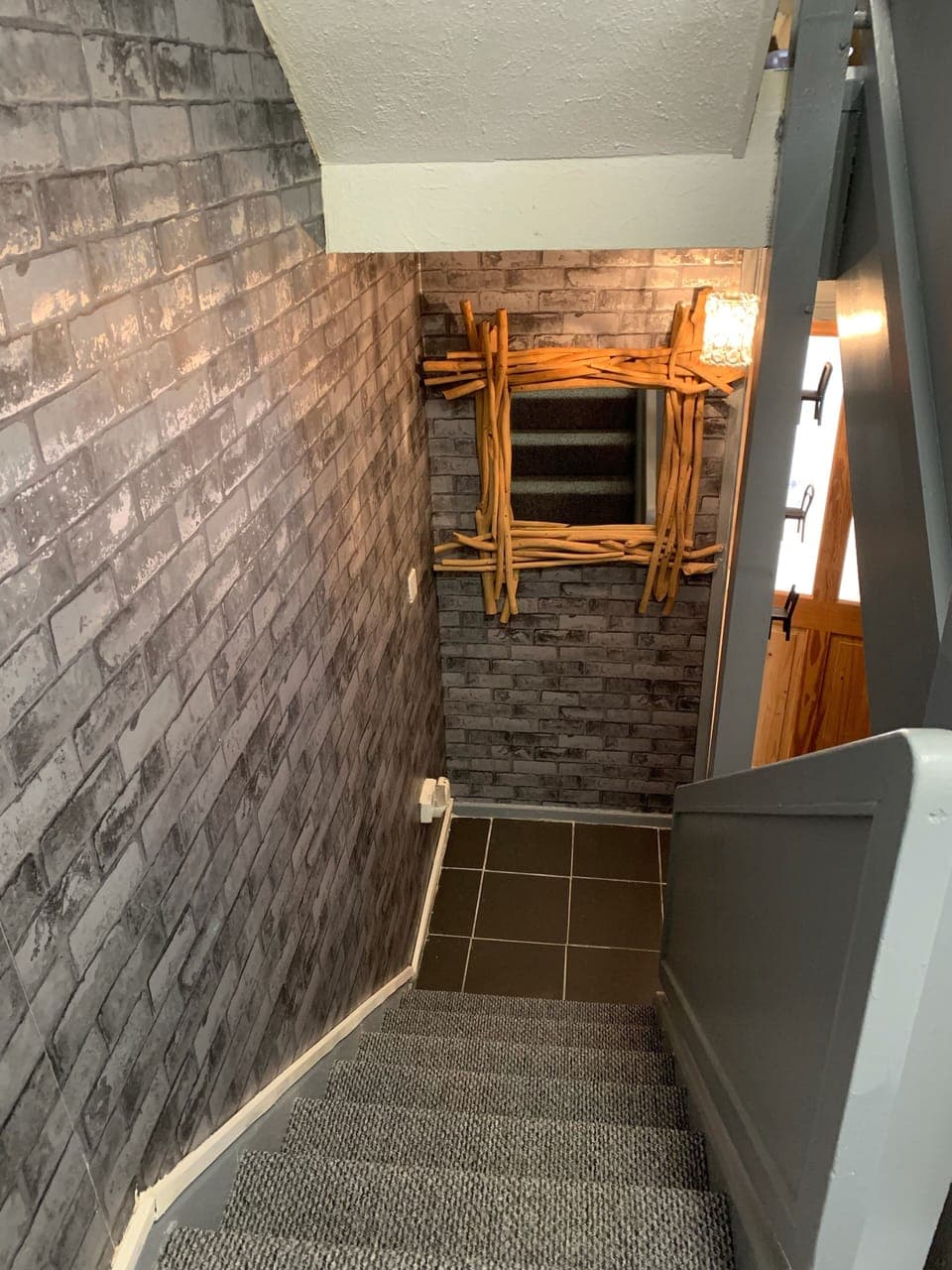 Stairs down to lounge and bathroom 2 