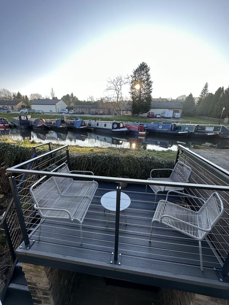Seating area by the canal.  Great for evening sunsets, and watching boats!