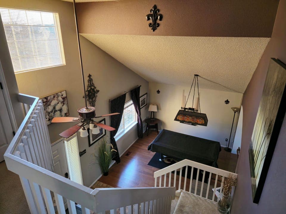 Overview of pool table and front entry.