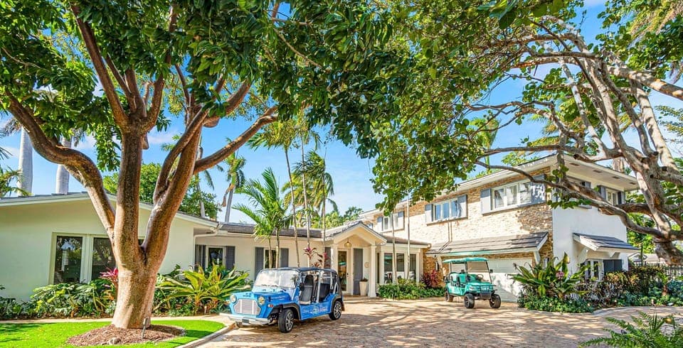 This Spanish Revival ample residence is located in the private  Harbor Beach neighborhood.