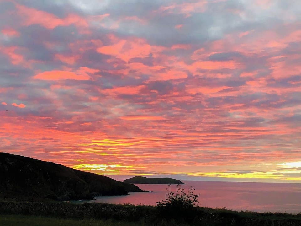 Sunset at Mwnt beach | Hafan Gwyn - Cardigan Bay Cottages, Felinwynt, near Cardigan