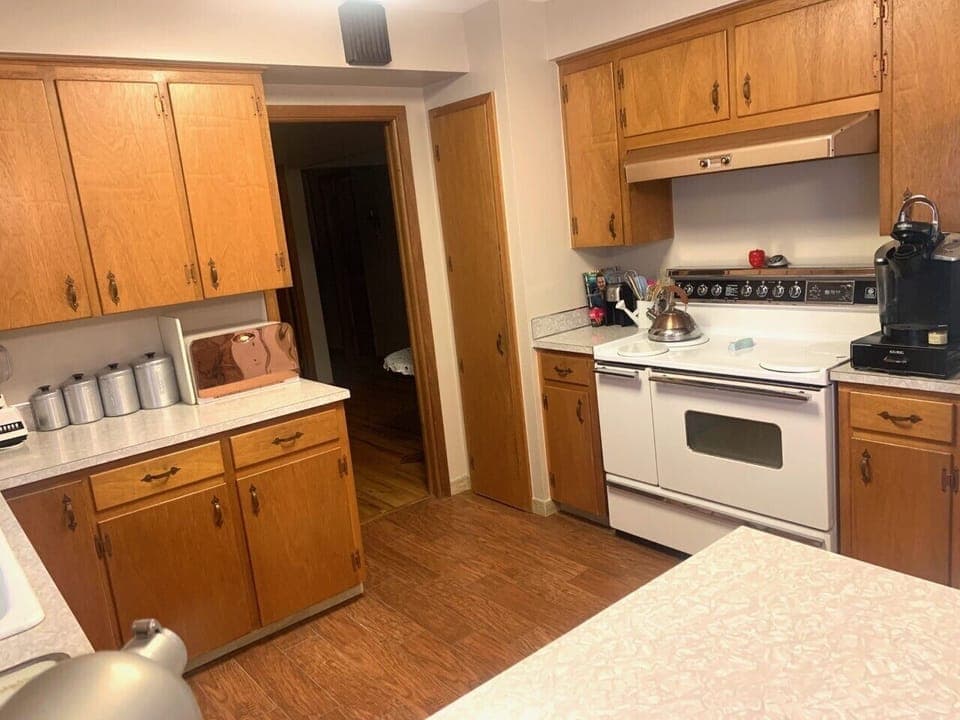 Kitchen Photo #2, if you look close you'll find a Food Network stars cookbook! 