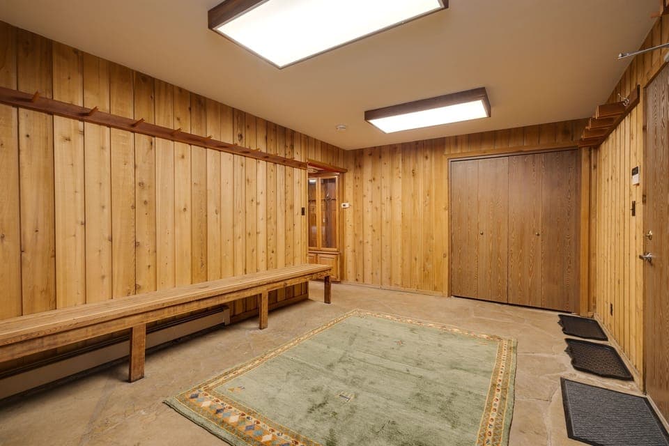 The large mud room with ski storage is the perfect place to store your boots, boards, and skis!