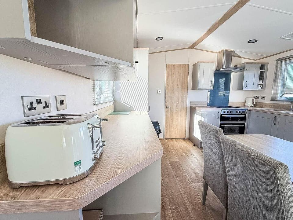 Whether you are preparing a delicious breakfast or unwinding with a movie after a busy day on the Norfolk coast, the open plan lounge offers a space where everyone can stay connected.