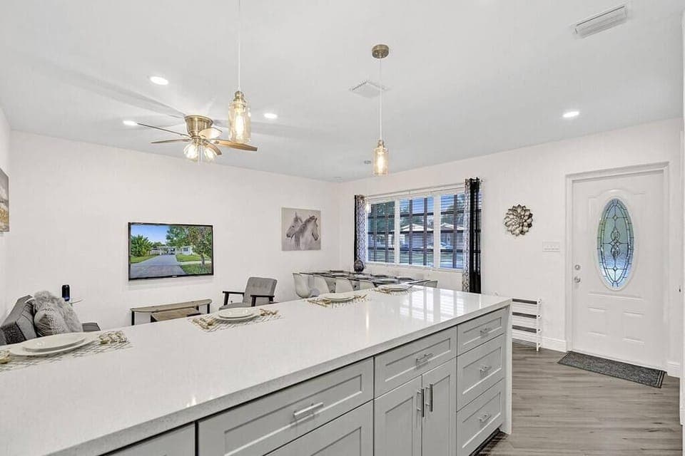 The kitchen island is very large. You can entertain your family while you cook. 