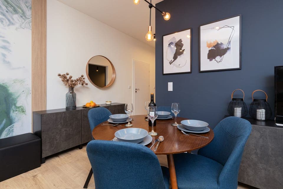 The living room offers a perfect blend of comfort and modern style. 