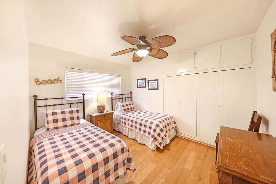 The fourth bedroom is flanked by two twin size beds.
                