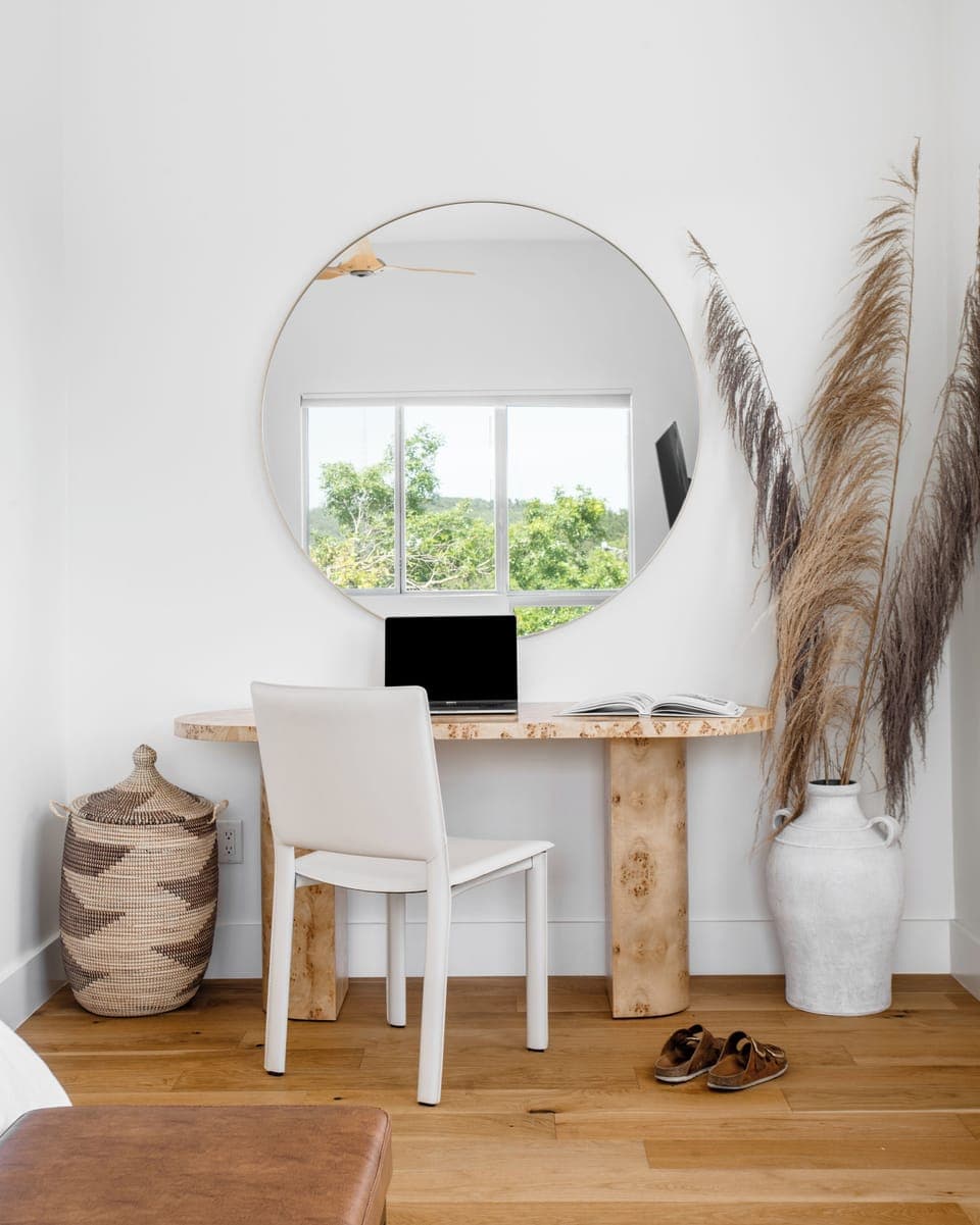 Desk area in third floor primary bedroom, located on the west side of the house.