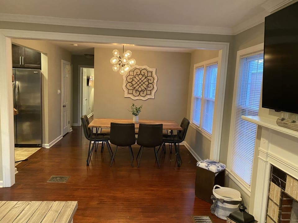 Dining room open to living room and kitchen.  Seating for 6+
