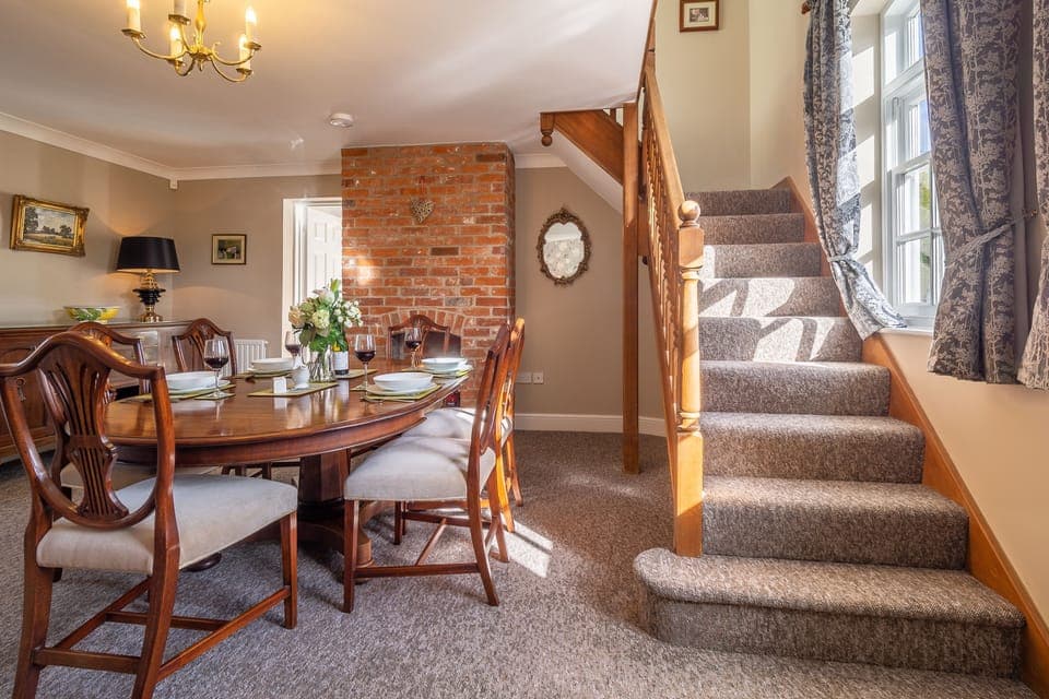 Ground floor: Dining room and stairs to the first floor