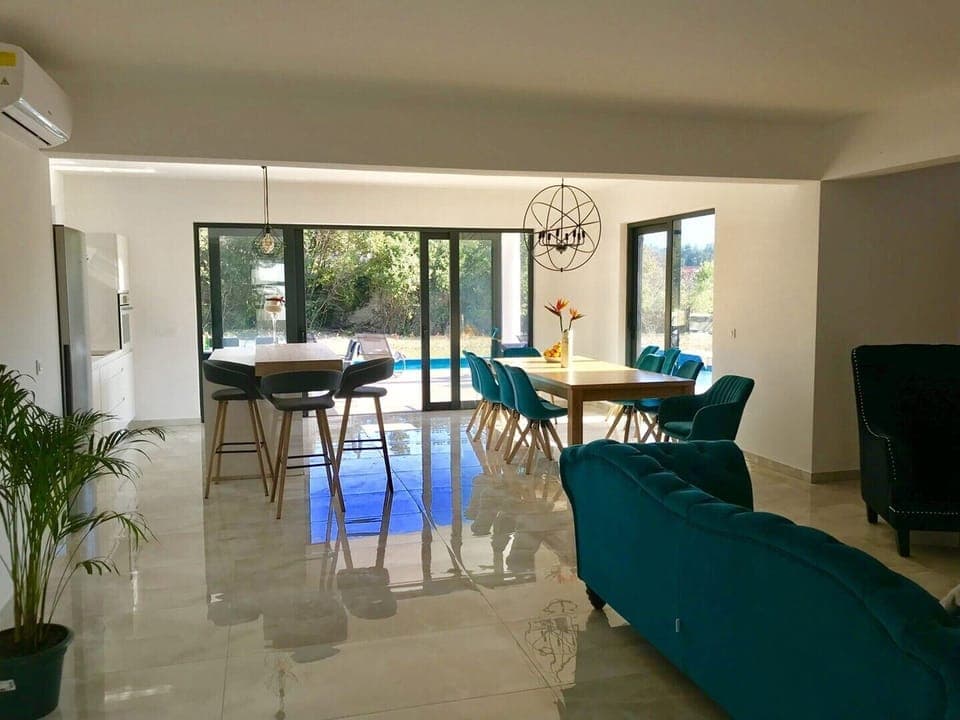 Open space dining and living room in the luxury vacation villa for families with kids near Dubrovnik