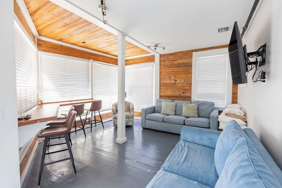 Living Space with Two Queen Sofa Beds