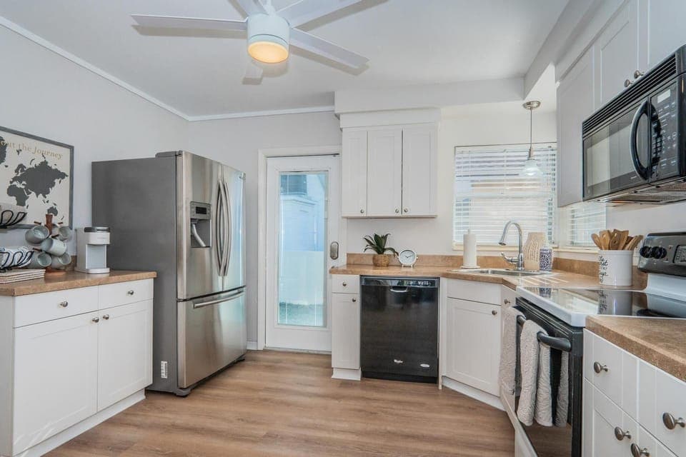 Kitchen with door to backyard.