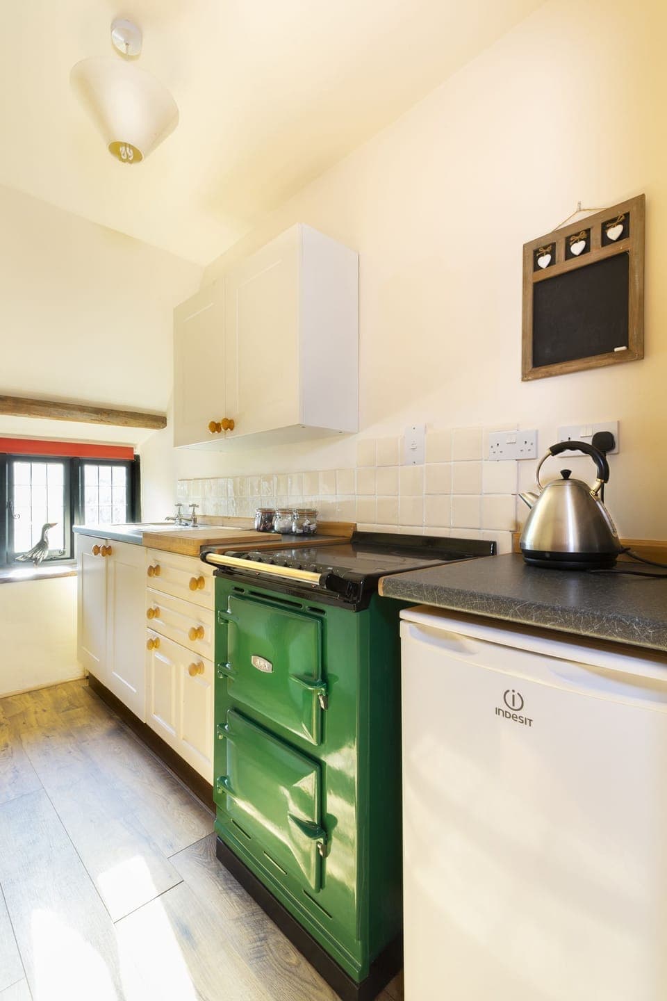 The fully equipped kitchen includes an Aga oven & hob and all the utensils you may need.