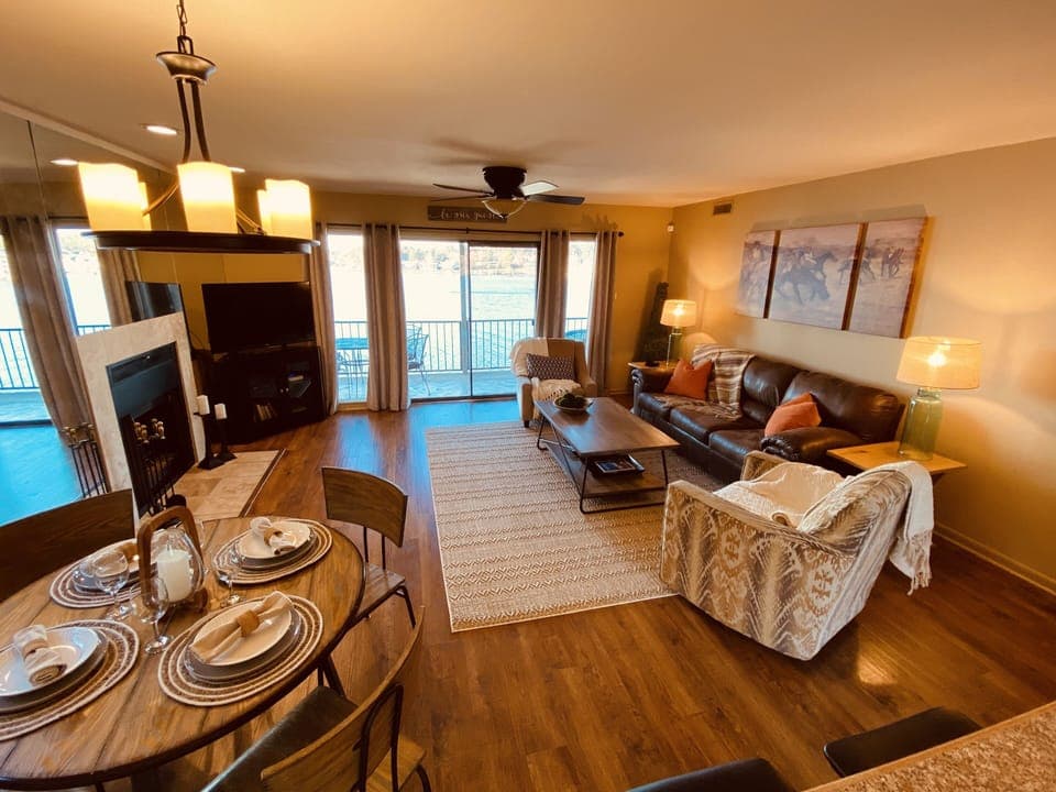 Warm, welcoming living space … with incredible lake views and balcony access. 