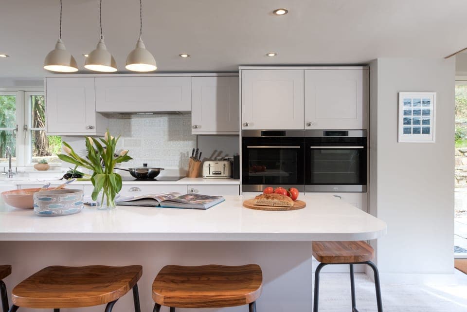 Beach Cottage, St Agnes. Ground floor: Fully-fitted kitchen with double electric oven, hob, microwave, American fridge freezer, dishwasher, wine fridge, coffee machine and Bluetooth speaker