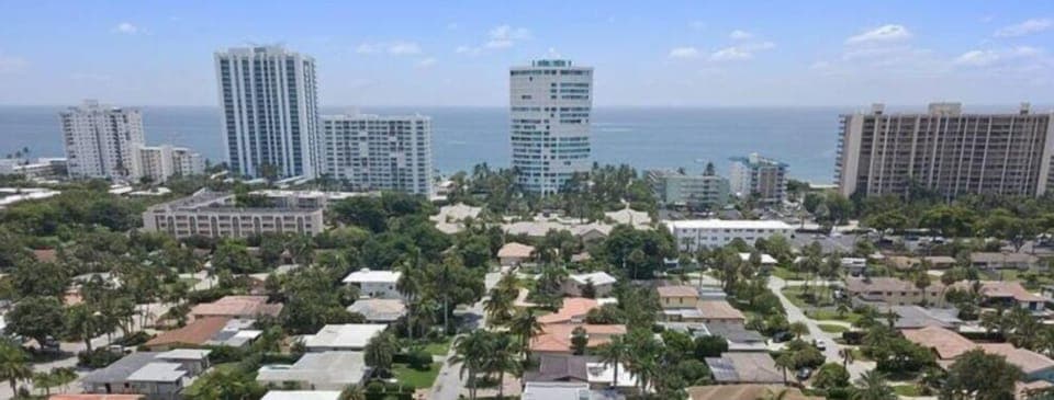 Arial view of the home in relation to A1A- 12 minute walk to beach. 